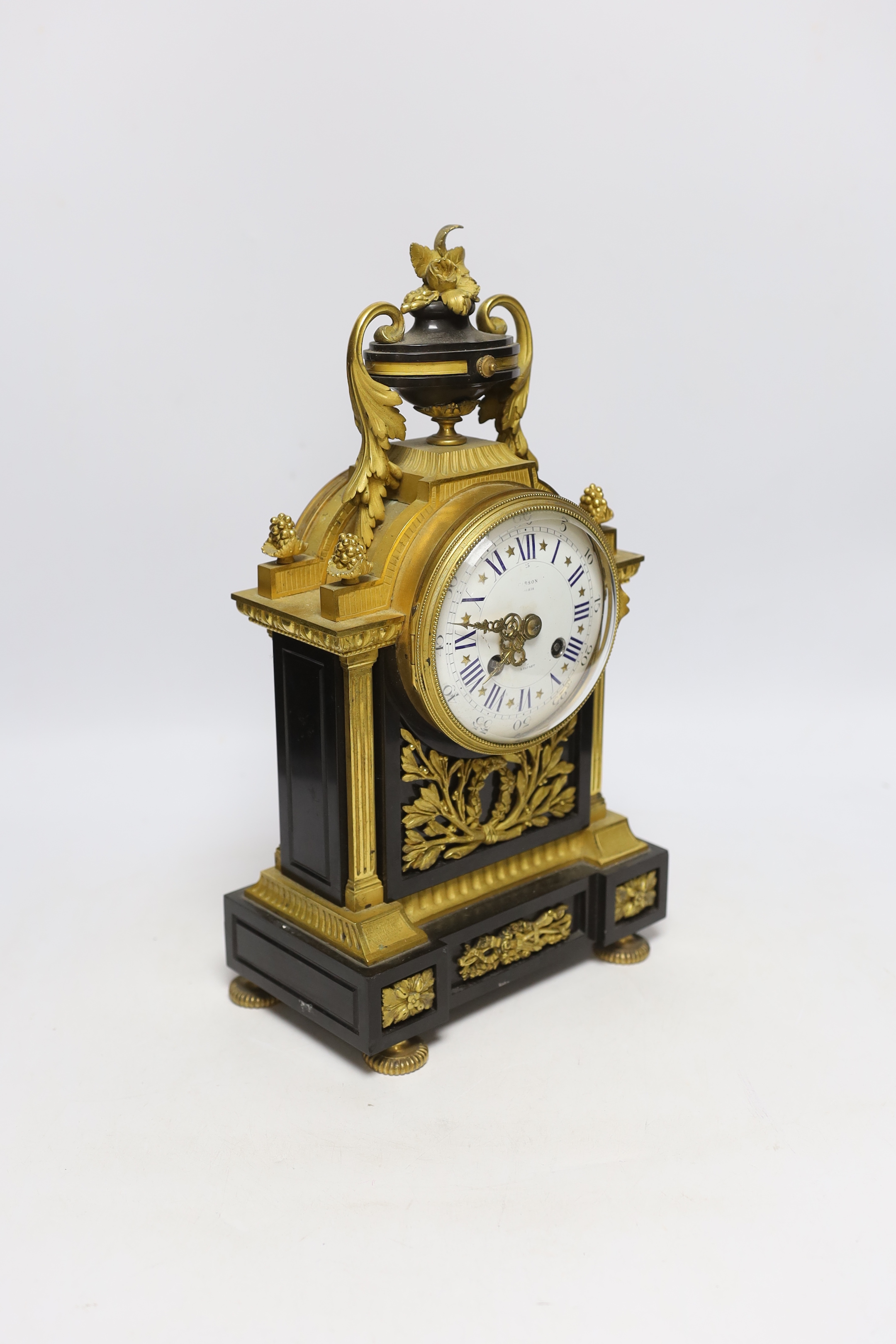 A Louis XVI style bronze and ormolu mantel clock, the enamel dial inscribed Gibson, Paris, 37cm high